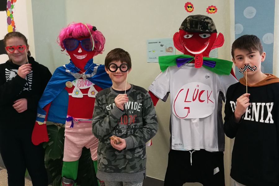Glück macht Schule